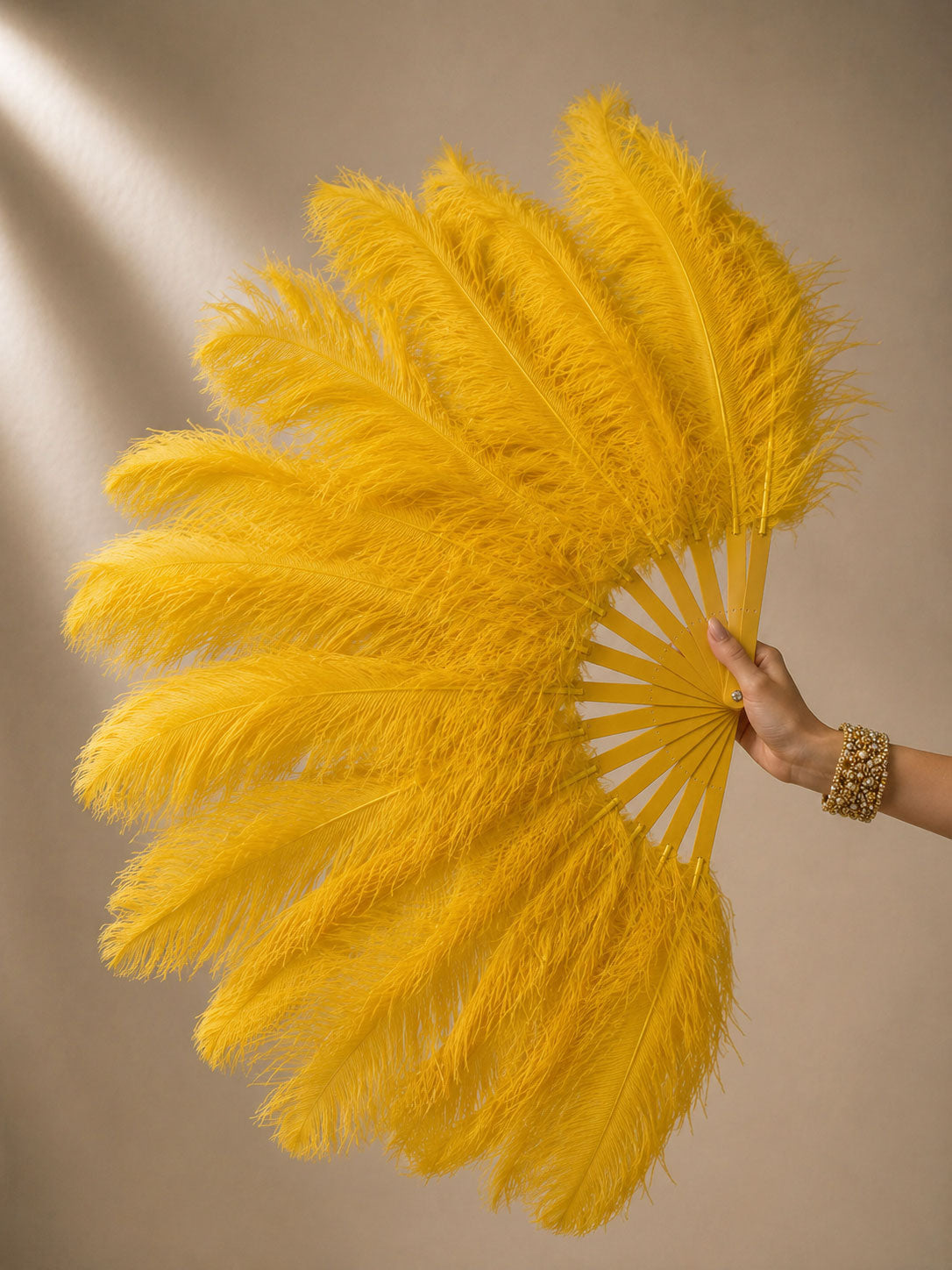 Side view of BurlyLuxe 180° Single Layer Ostrich Feather Fan 25" × 50".