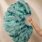 Close-up of BurlyLuxe Single Layer Beginner's Double-Sided Stage Ostrich Feather Fan 25" × 47" showing feather texture and fan shape.