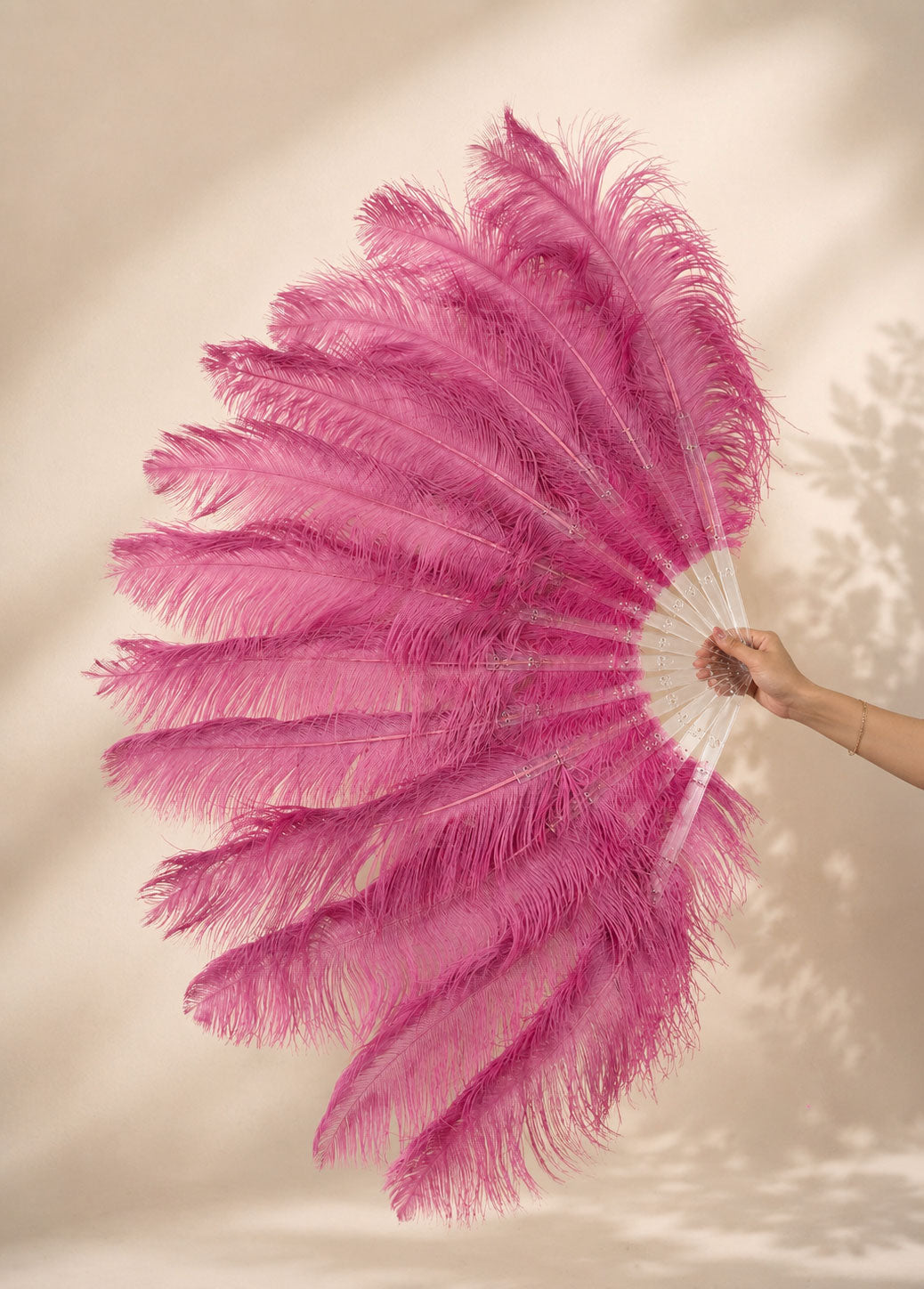 Side view of BurlyLuxe Single Layer Beginner's Ostrich Feather Fan 25" × 45"