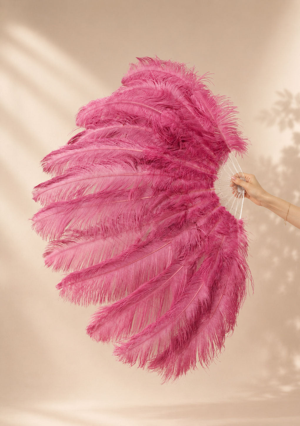 Close-up of BurlyLuxe Single Layer Beginner's Ostrich Feather Fan 25" × 45" showing feather texture and fan shape.