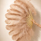 Close-up of BurlyLuxe Natural Single Layer Ostrich Feather Fan showing feather texture and fan shape.