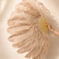 Side view of BurlyLuxe Natural Single Layer Ostrich Feather Fan.